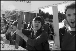 Students protest fee increases and budget cuts. This rally was part of a statewide action.