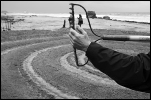 At the river mouth this morning, working in wind and rain, Dean, Irene and Christian created a labyrinth. (see March 21, 2010 post)