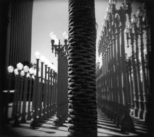 In front of the Los Angeles County Museum of Art is a sculpture by Chris Burton. It's made of two-hundred and two restored cast iron antique street lamps from the LA area. 